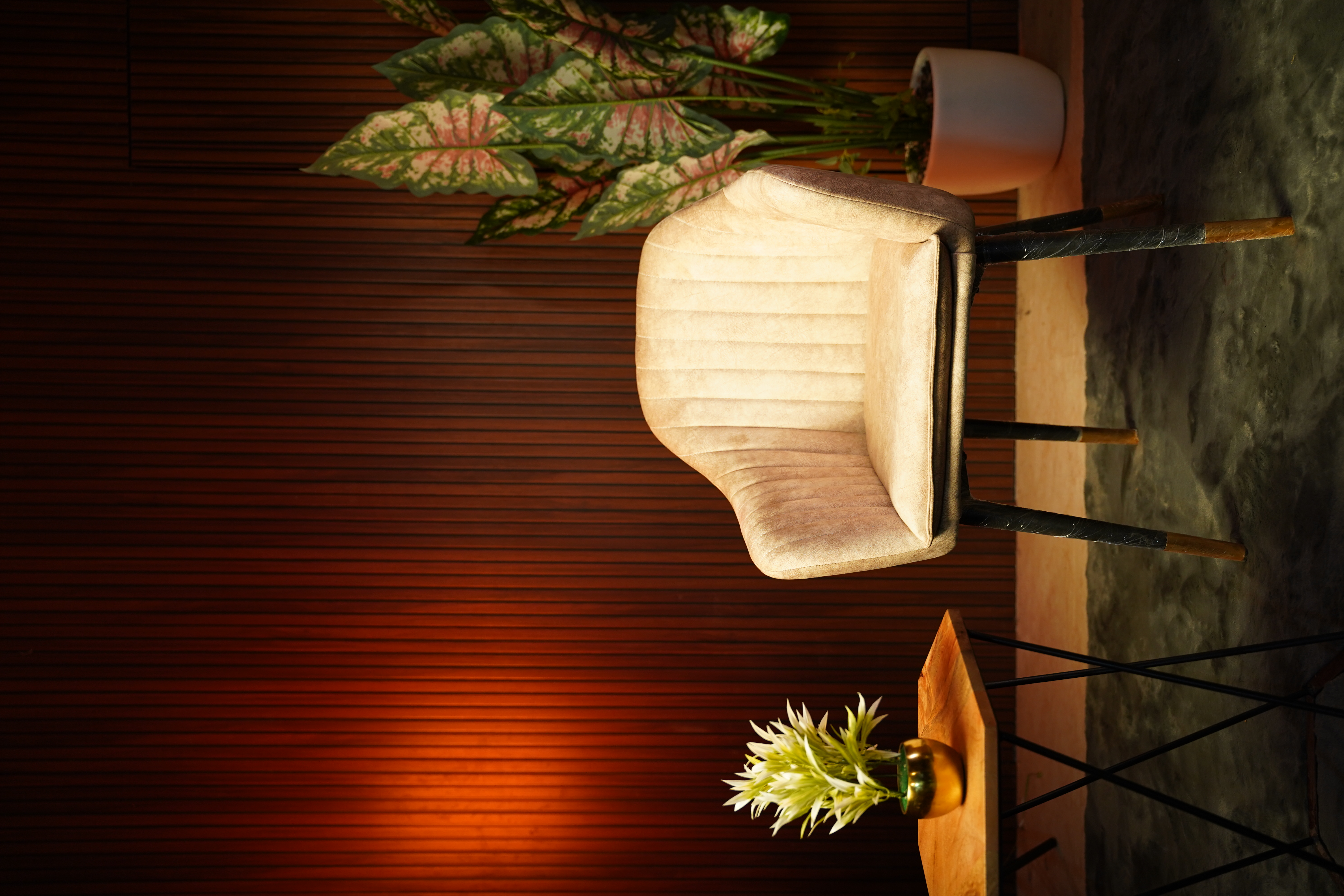 Styled shoot set with velvet chair and warm lighting — photo studio Chennai